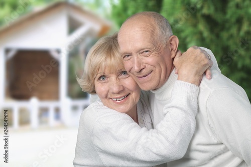 Portrait of happy senior couple smiling at home © BillionPhotos.com