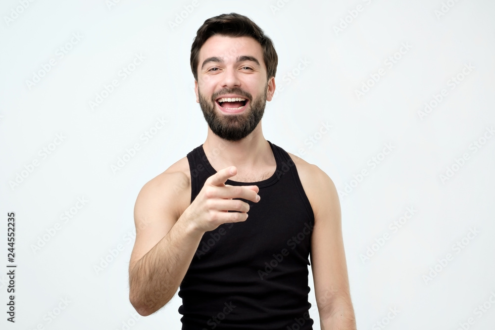 Spanish man mocking you or laughing on his friend joke Spanish man mocking you or laughing on his friend joke