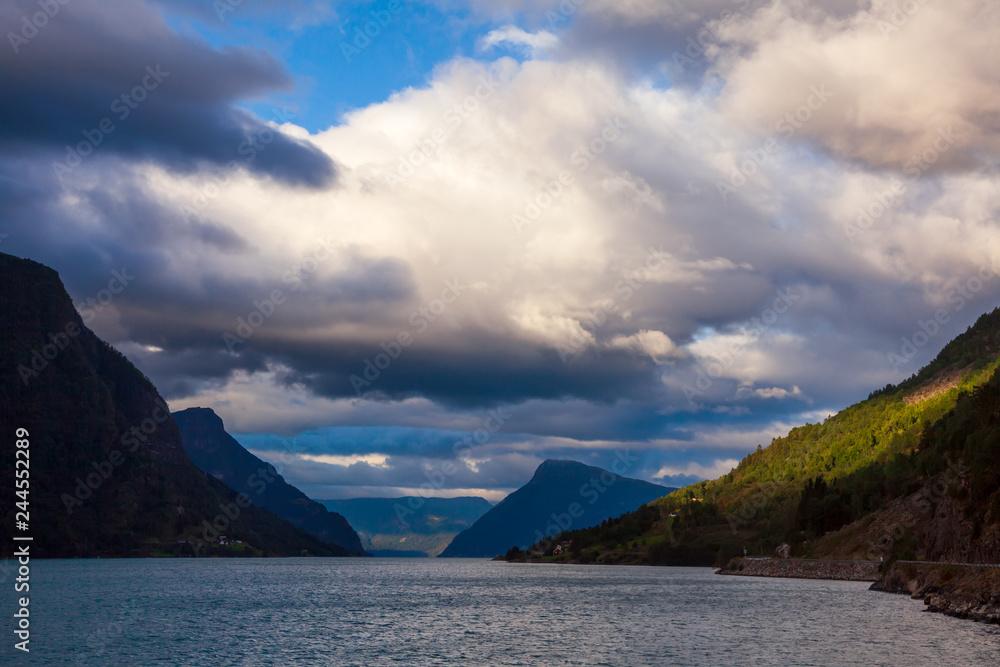 Moody sky over the Lustrafjord branch of greater Sognefjord Luster Sogn og Fjordane Norway Scandinavia Moody sky over the Lustrafjord branch of greater Sognefjord Luster Sogn og Fjordane Norway Scandinavia