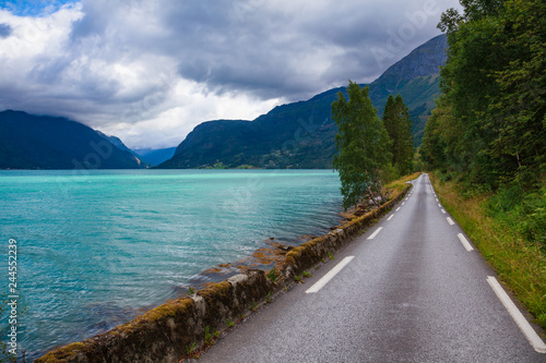 Scenic road along the Lustrafjord branch of greater Sognefjord Luster Sogn og Fjordane Norway Scandinavia photo