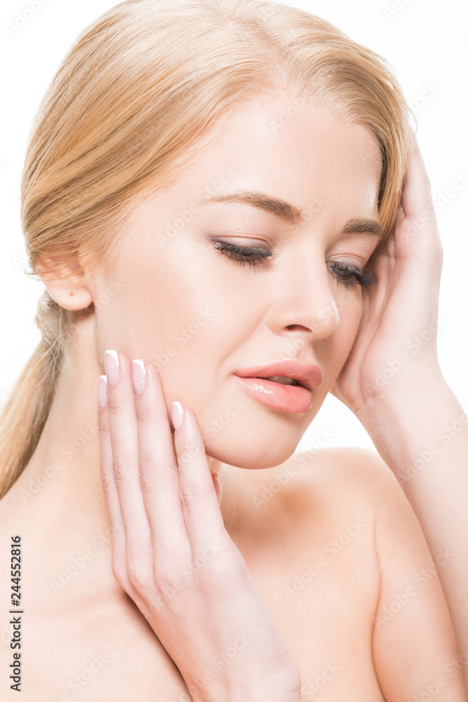 close-up view of beautiful tender blonde girl touching face and looking down isolated on white close-up view of beautiful tender blonde girl touching face and looking down isolated on white