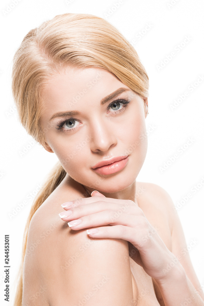 attractive naked woman touching shoulder and looking at camera isolated on white attractive naked woman touching shoulder and looking at camera isolated on white