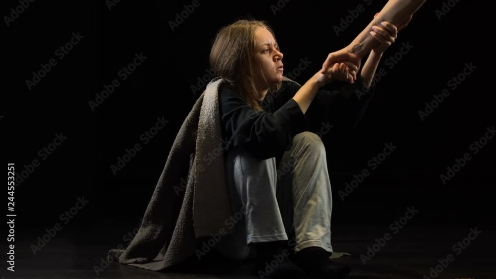 Lonely miserable victim of domestic violence taking helping hand, belief concept