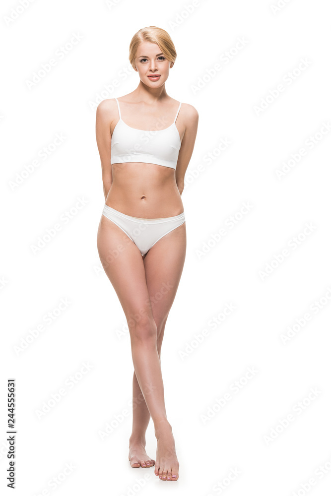 full length view of beautiful slim girl in underwear standing and looking at camera isolated on white full length view of beautiful slim girl in underwear standing and looking at camera isolated on white