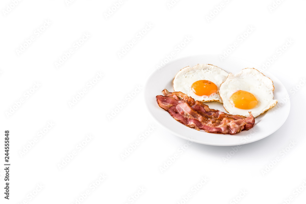 Fried eggs and bacon for breakfast isolated on white background. Copyspace
Fried eggs and bacon for breakfast isolated on white background. Copyspace