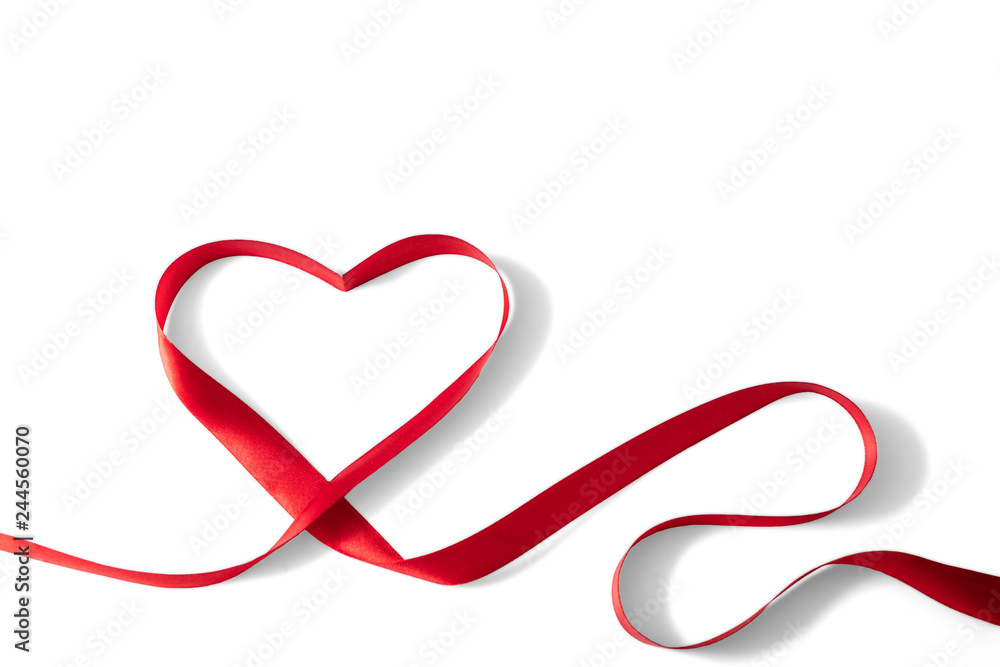 Heart shaped red ribbon for Valentine's day celebration on an isolated white background Heart shaped red ribbon for Valentine's day celebration on an isolated white background