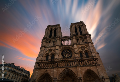 Cathedral Notre Dame de Paris, and long exposure clouds. Paris, France. 