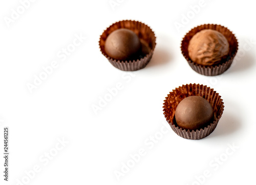 Chocolate pralines isolated on white background