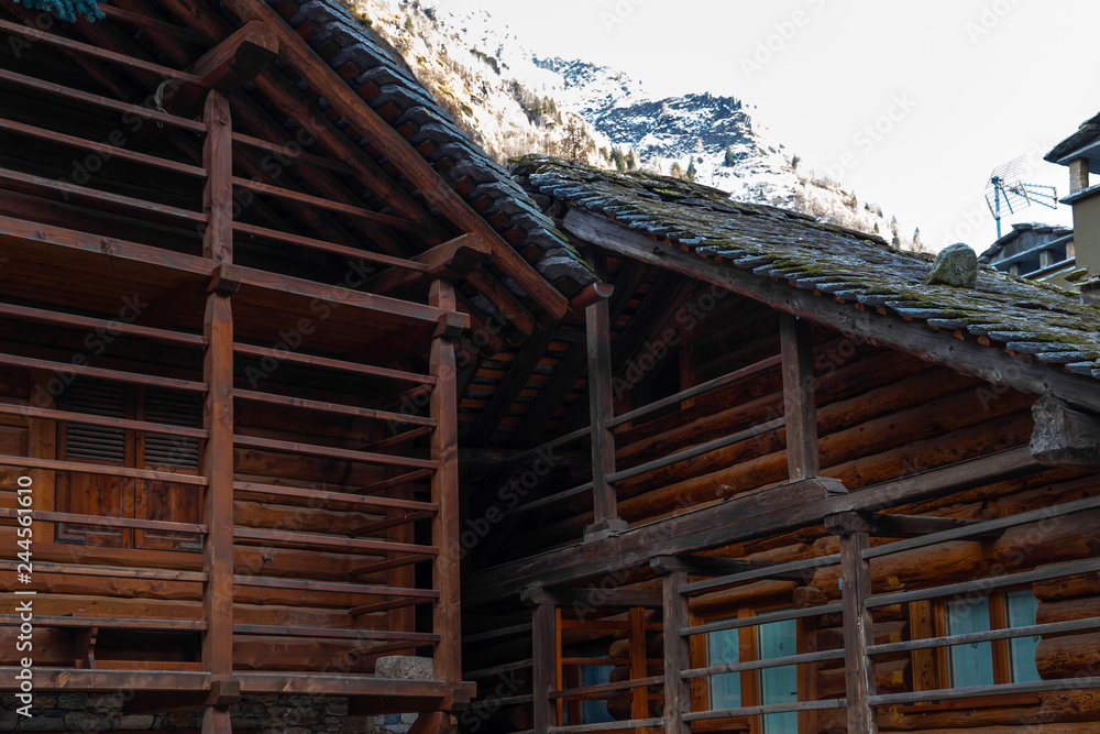 Fototapeta premium Mountain panorama with peaks, snow, villages, streams and trails