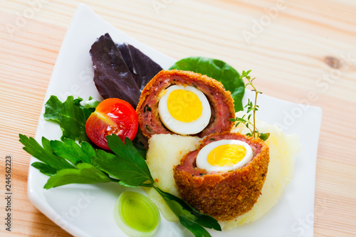 Quail egg wrapped in sausage meat (Scotch egg)
