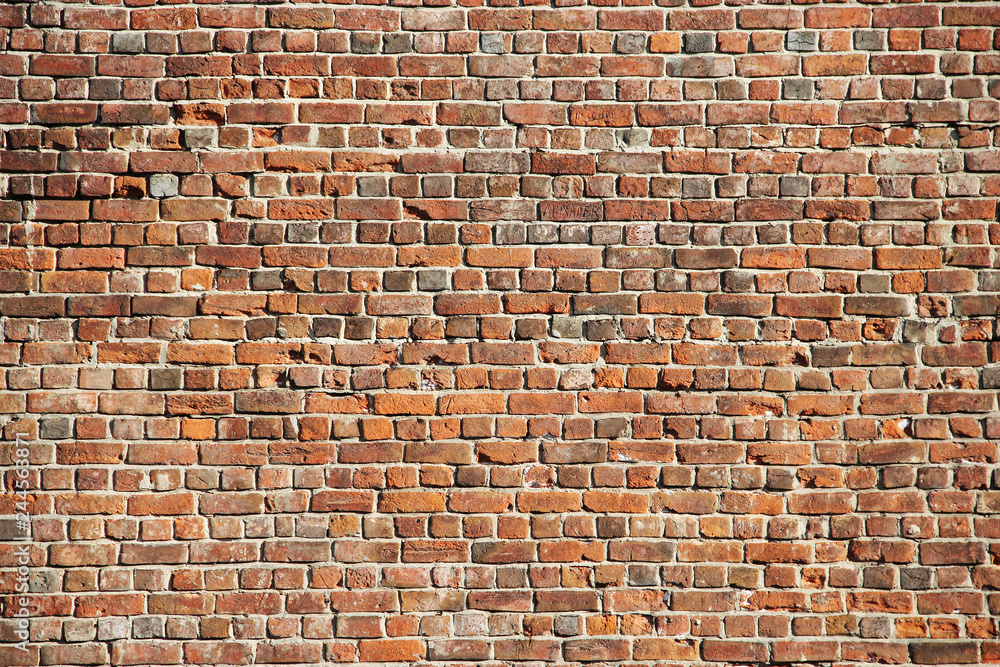 Naklejka premium Red brick wall background