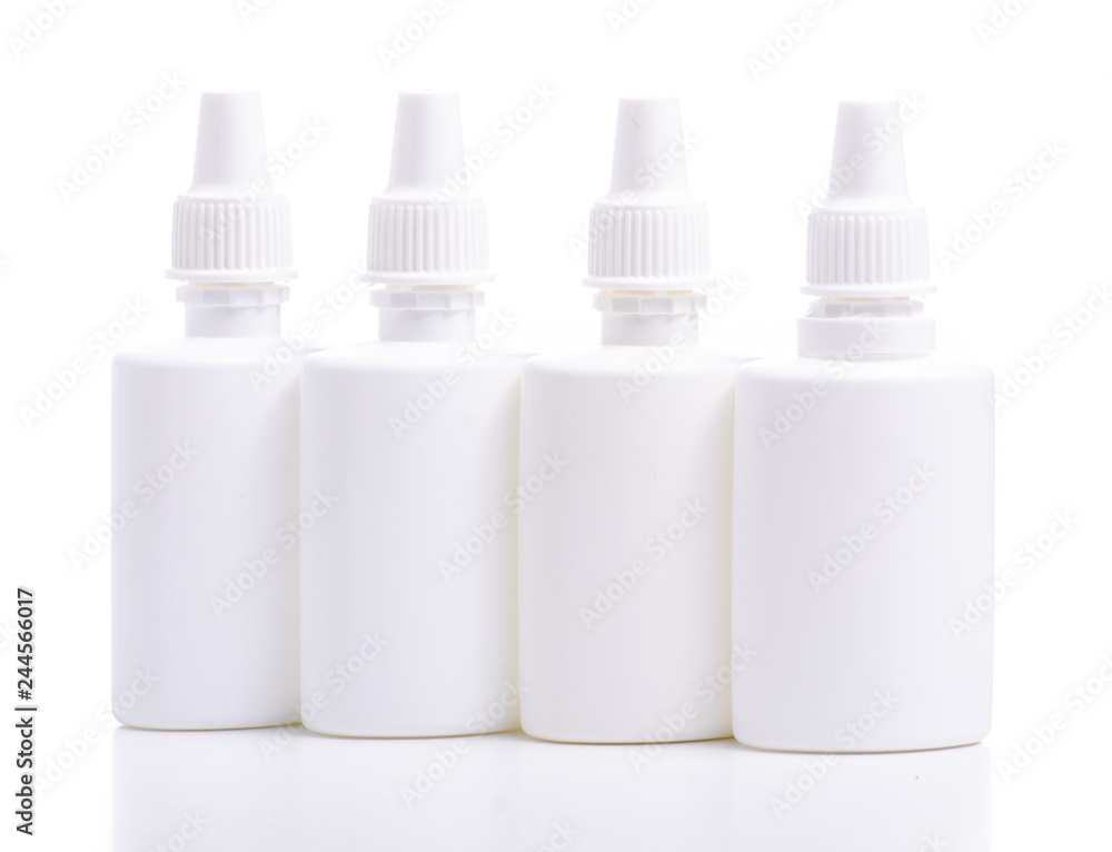 White bottles nose spray on white background isolation White bottles nose spray on white background isolation