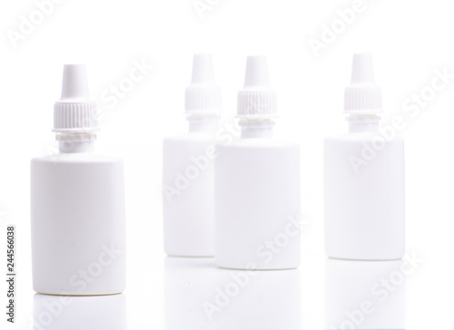 White bottles nose spray on white background isolation