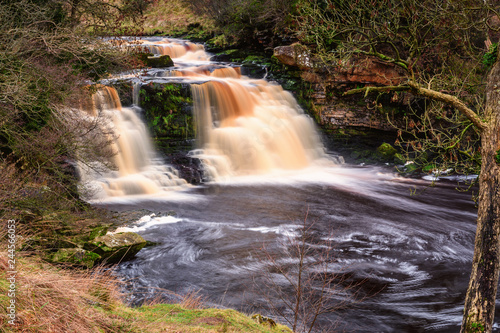 Waterfall at Crammel Linn  as the River Irthing flows over the 10 metre falls it marks the boundary between Northumberland and Cumbria just north of Gilsland  England