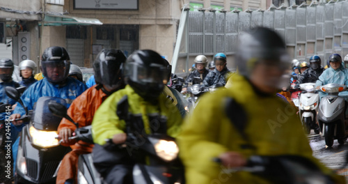 Crowded of scooter in taipei city at rain day