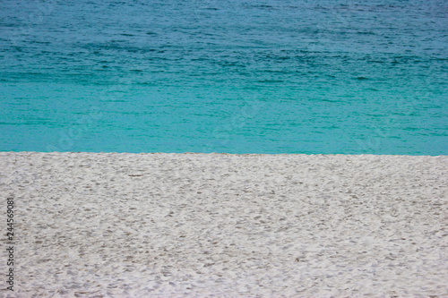 White sand beach and blue waves sea at Shirahama beach. photo