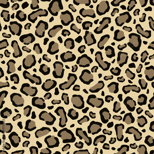 An animal drawing of a leopard skin . Seamless color vector.