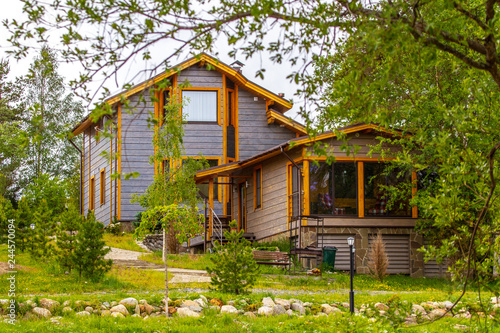 Two houses. Cottage surroun...