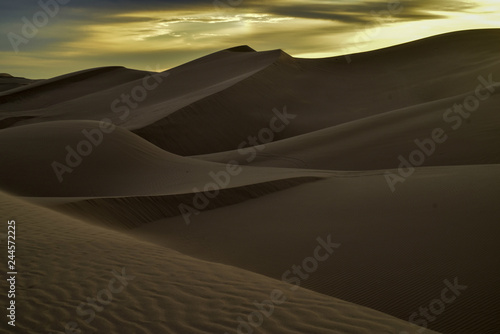 sunrise walk in sand dunes, Imperial Sand Dunes, California, USA © mariekazalia