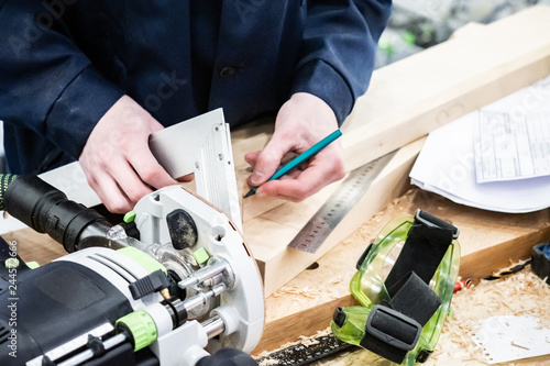 Work at work. A carpenter. ...