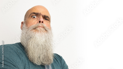 skeptical looking bearded man photo