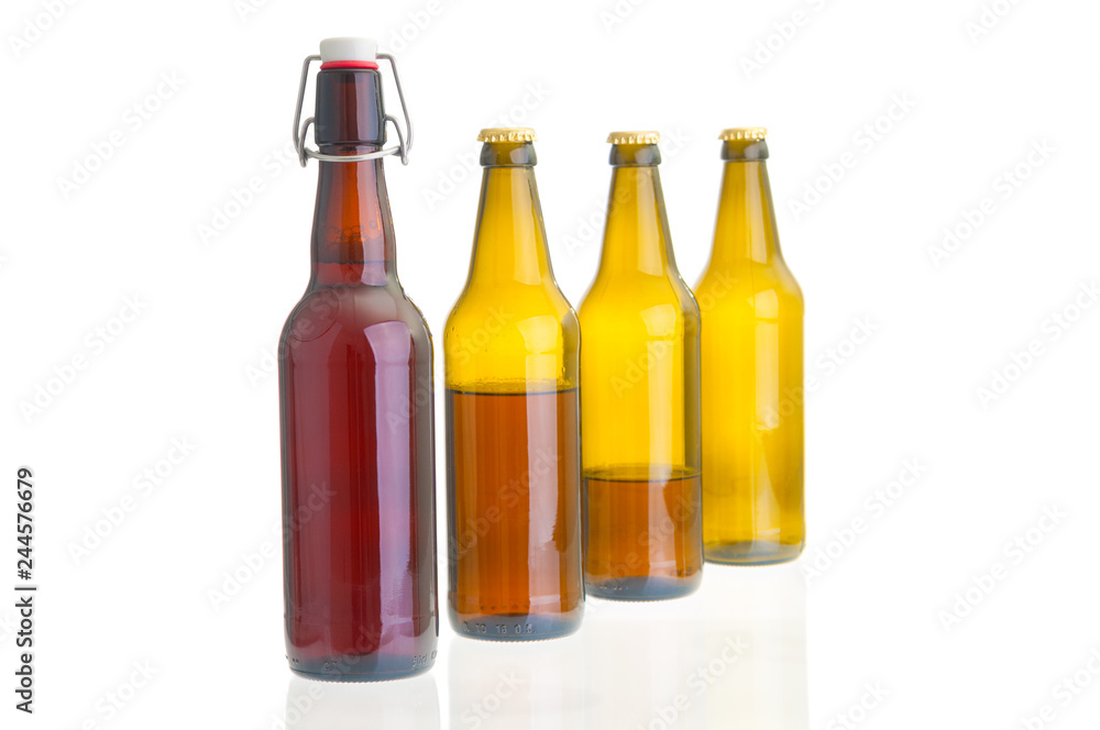 Row of beer bottles on white background Row of beer bottles on white background