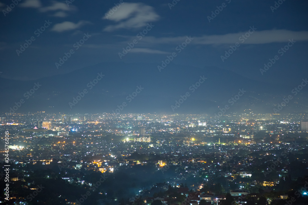 Aerial Night City Panoramic View of Bandung Cityscape, West Java, Indonesia