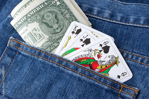 Playing cards in jeans pocket