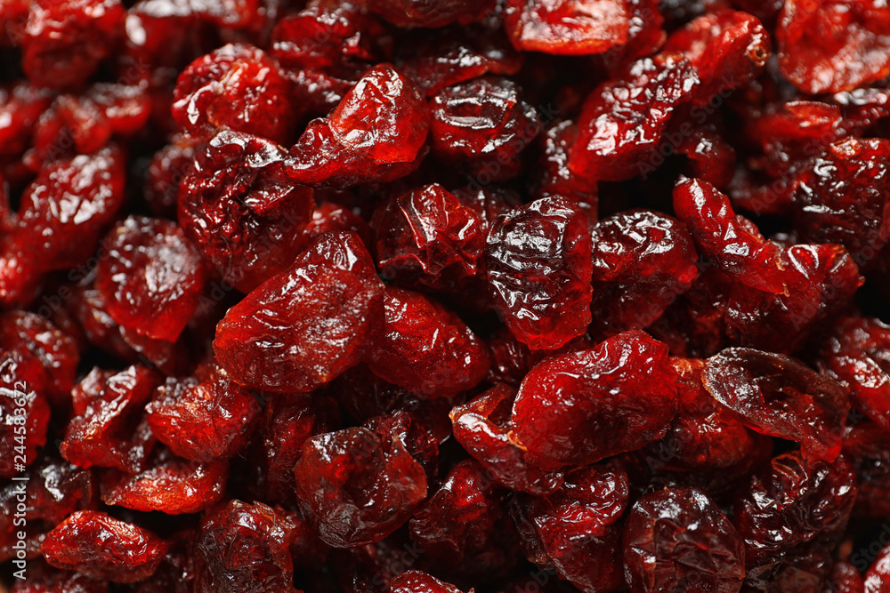 Tasty cranberries as background, top view. Dried fruits as healthy snack Tasty cranberries as background, top view. Dried fruits as healthy snack