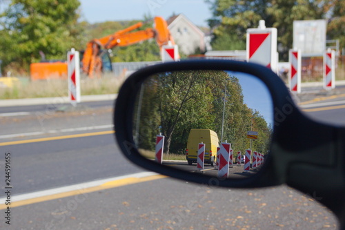 side rear view mirror on a building site