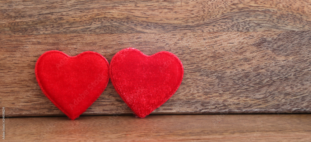 Obraz premium Valentine's Day background with two big red hearts, small hearts and dried roses, mother's day background