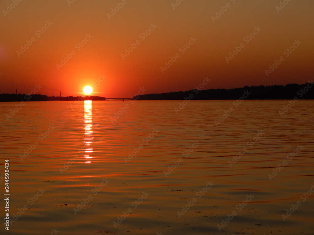 Beautiful sunset on the river Dnieper