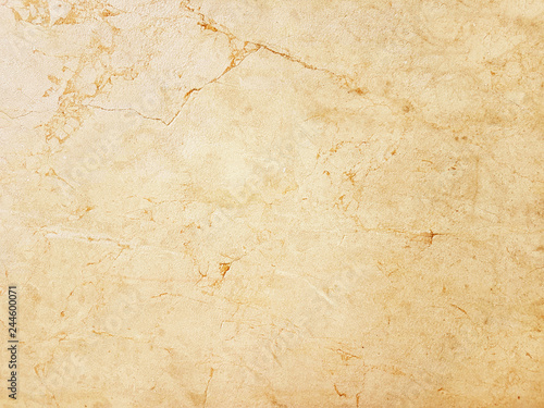 The plate is made of yellow marble with a red streaks. brownish-white shades. Smooth texture for design and decoration. Natural building material. Natural patterns on the stone. Plates for floor and