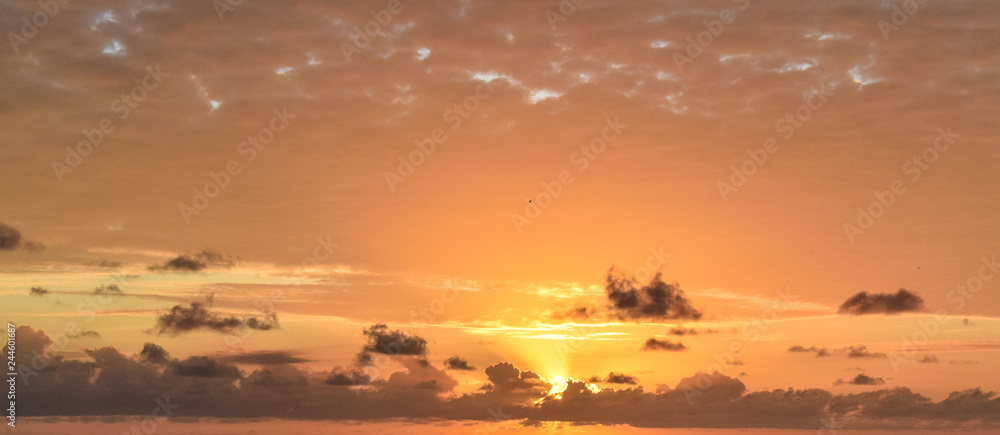 Fototapeta premium Coloured sunset on Seyshells island. Sea, summer, cloud, sky