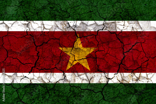 suriname country flag painted on a cracked grungy wall