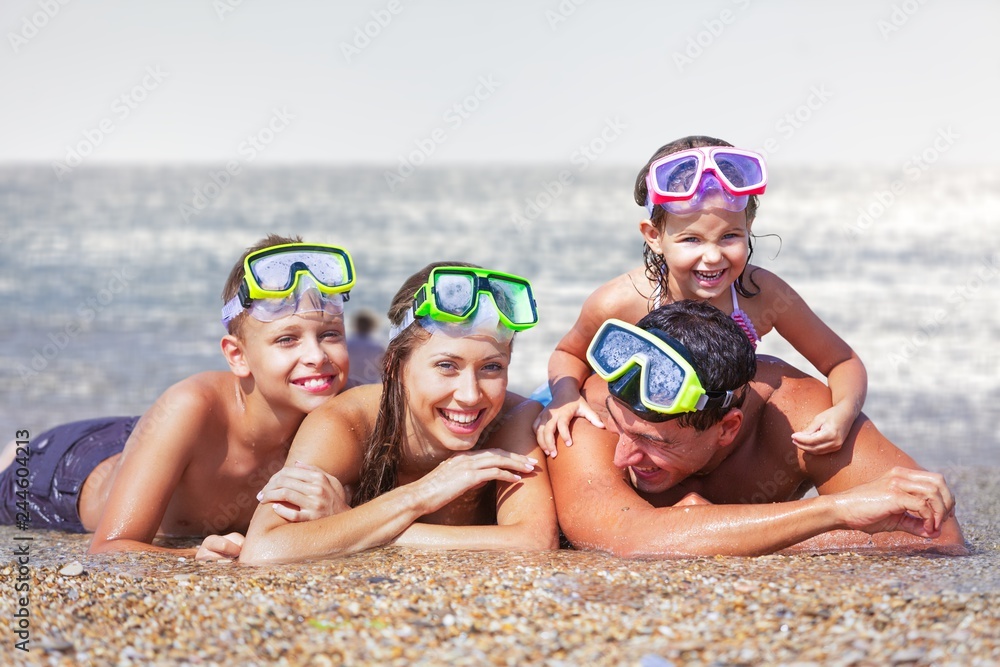 Happy family on vacations on beach Happy family on vacations on beach