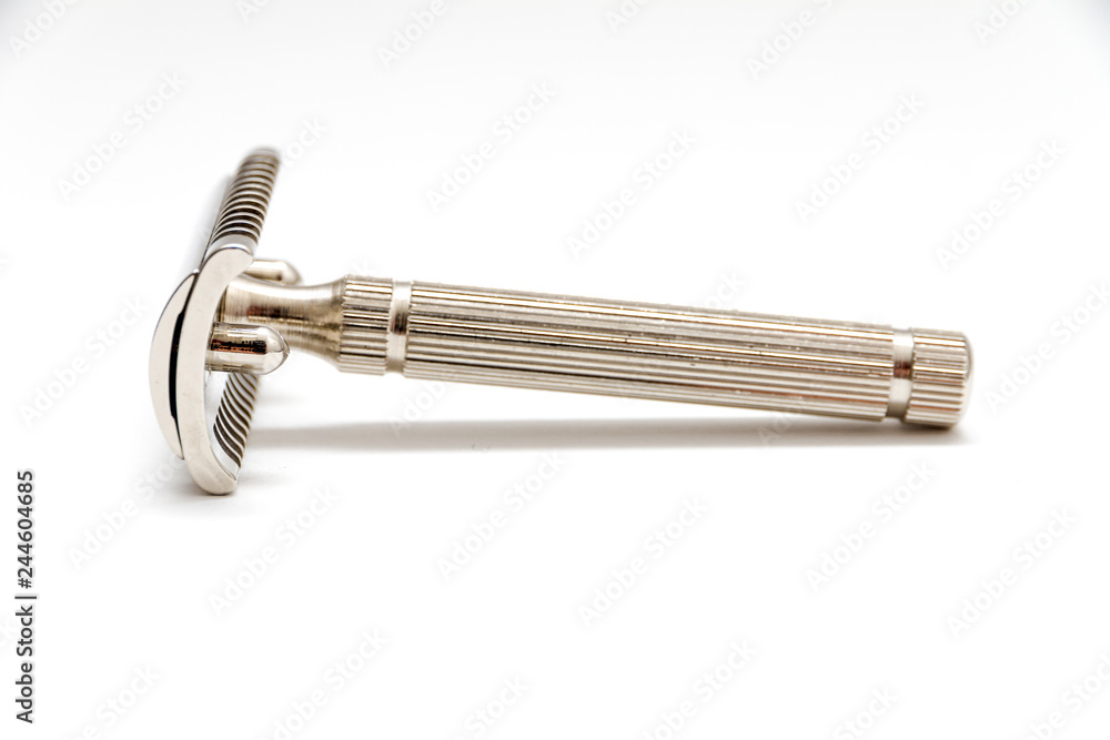 A traditional nickel plated open comb safety razor A traditional nickel plated open comb safety razor