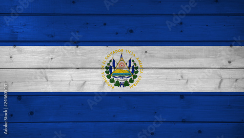 Flag of El Salvador on wooden background, surface. Wooden wall, planks. National flag