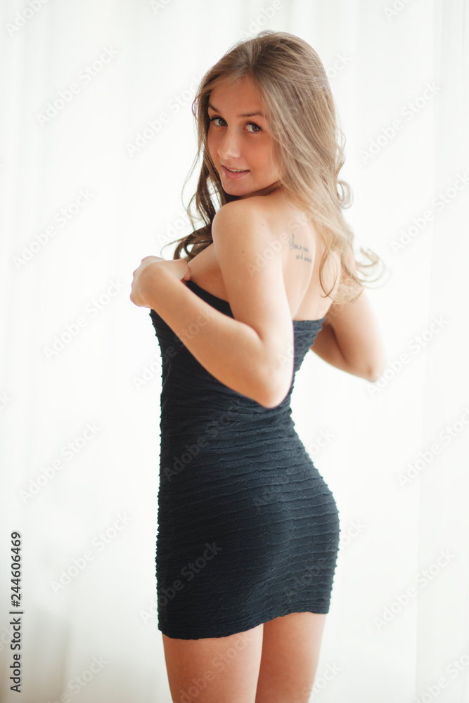 Beautiful young girl posing in home photo studio Beautiful young girl posing in home photo studio