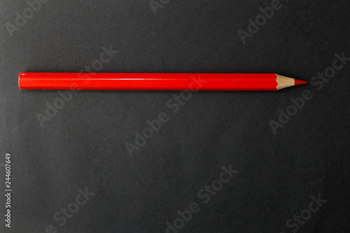 Red pencils isolated on the black background