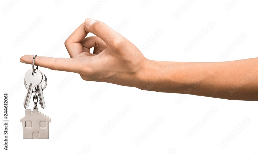Hand Holding House Key