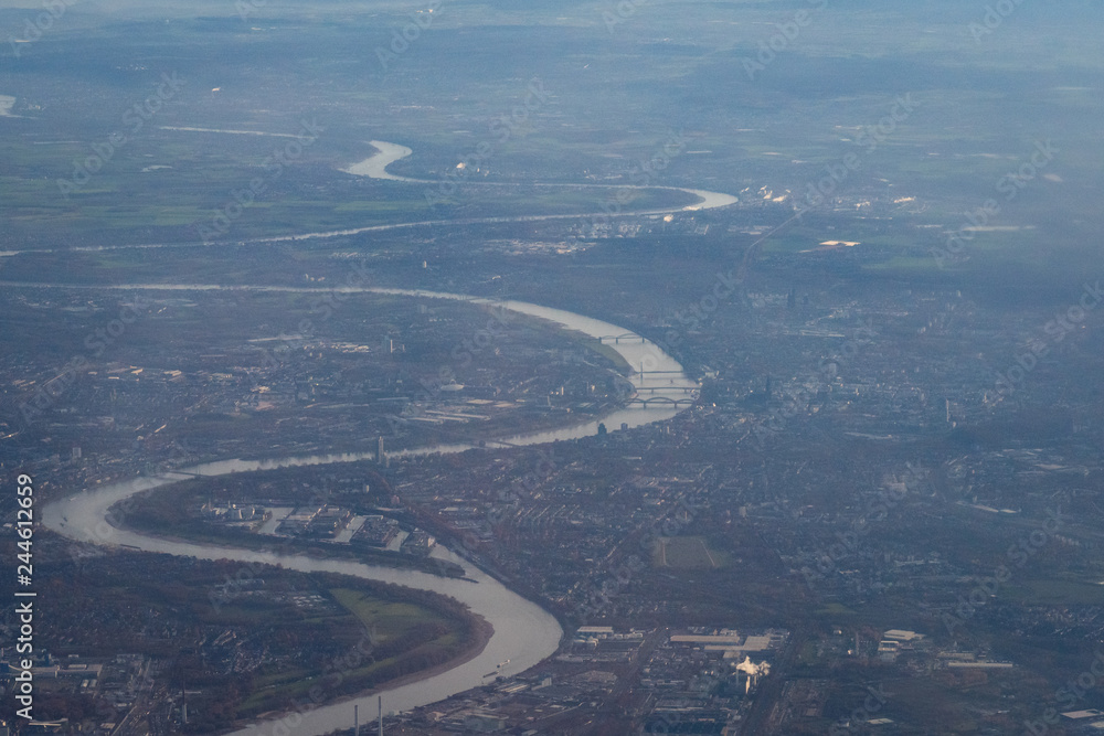 City of Cologne seen from air with Rhine river and cathedral