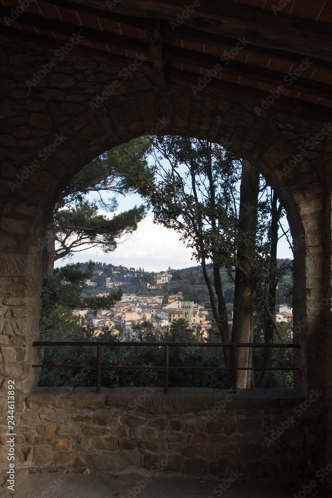 Tuscany landscape, view from an arch, Fiesole, Italy.