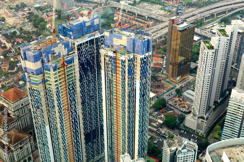 Canvas Print Elevated view looking across Kuala Lumpur on a hazy afternoon