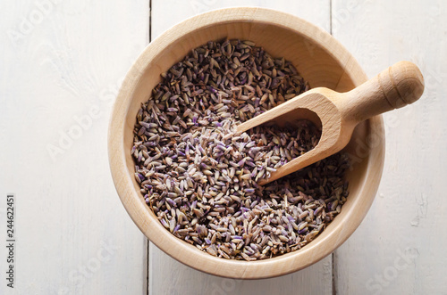 Fototapeta Naklejka Na Ścianę i Meble -  Bowl of Herbal Lavender Flower Buds with Scoop From Above