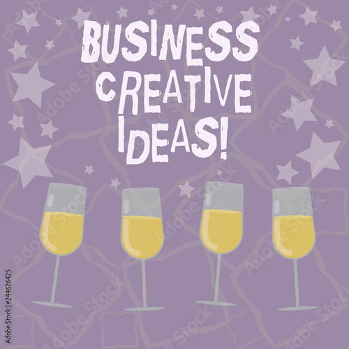 Writing note showing Business Creative Ideas. Business photo showcasing Concept that can be used for financial gain Filled Cocktail Wine Glasses with Scattered Stars as Confetti Stemware