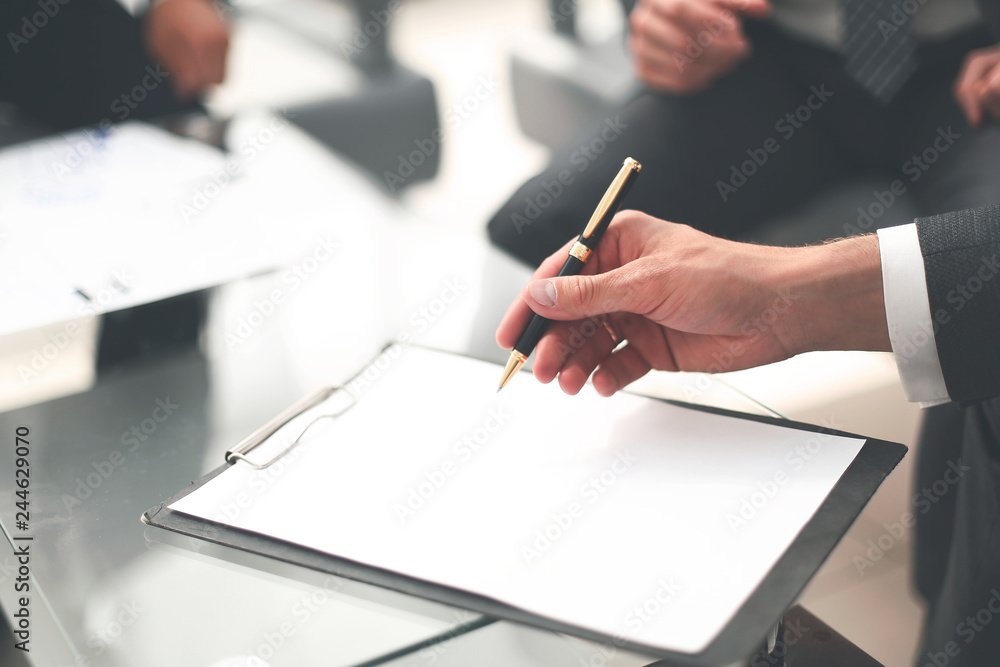 close up.businessman signs a contract close up.businessman signs a contract