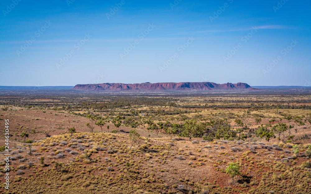 Distant scenic panorama of Gosse's Bluff an eroded remnant of an impact crater in central outback Australia