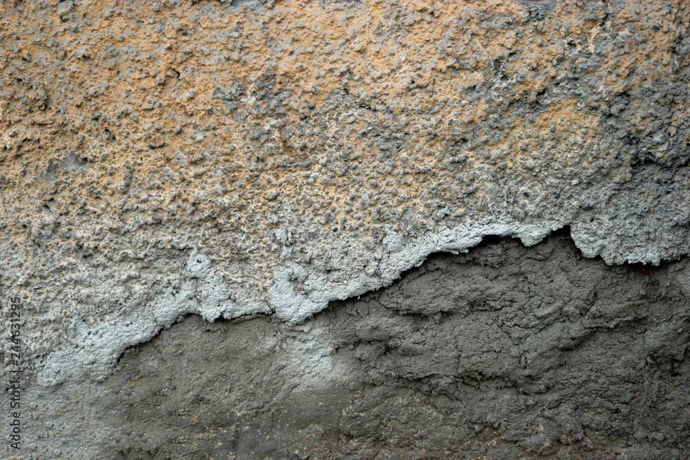 Fototapeta premium Half-plastered wall of abandoned building