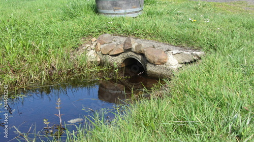 Small culvert with stream running through